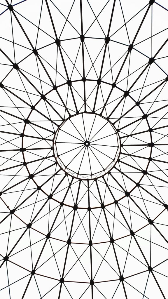 Artistic geometric dome ceiling with intricate lines and patterns in Leipzig, Germany.